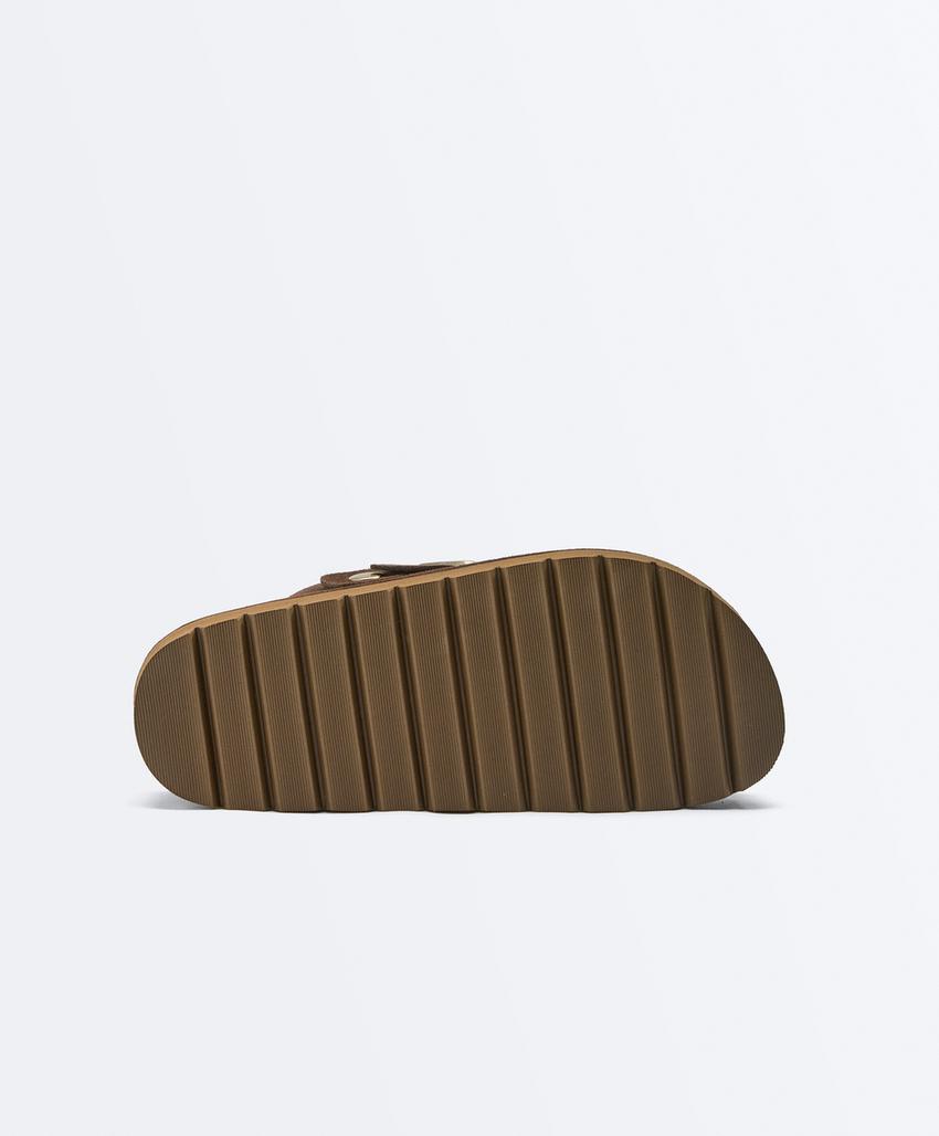 Замшевые тапочки с пряжкой