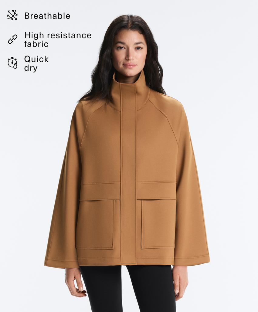 Длинная куртка с карманами и эффектом неопрена