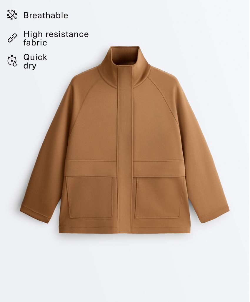 Длинная куртка с карманами и эффектом неопрена