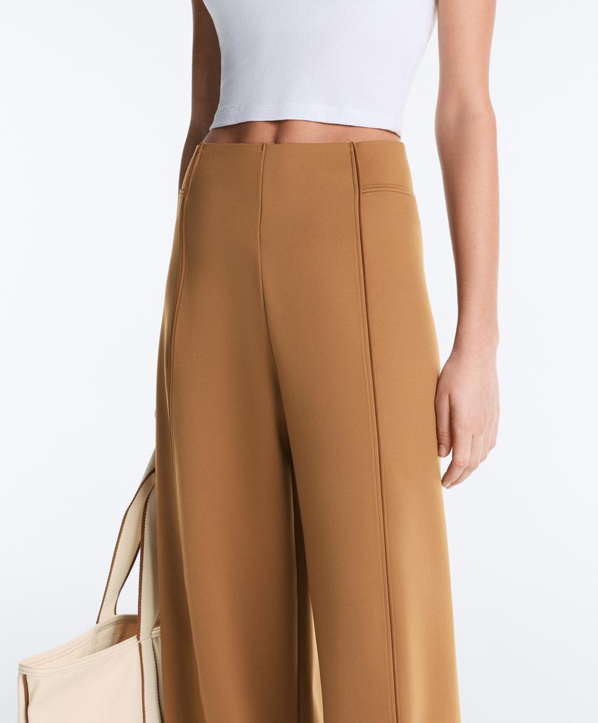 Широкие брюки  с эффектом неопрена