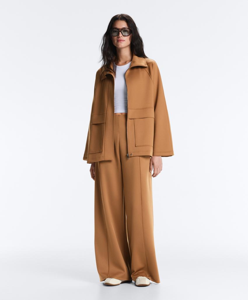 Широкие брюки  с эффектом неопрена