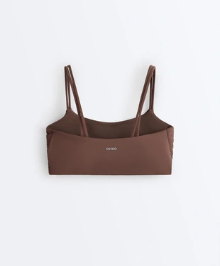 Спортивный бюстгальтер Comfortlux со средней поддержкой и плиссировкой- Заказать в России