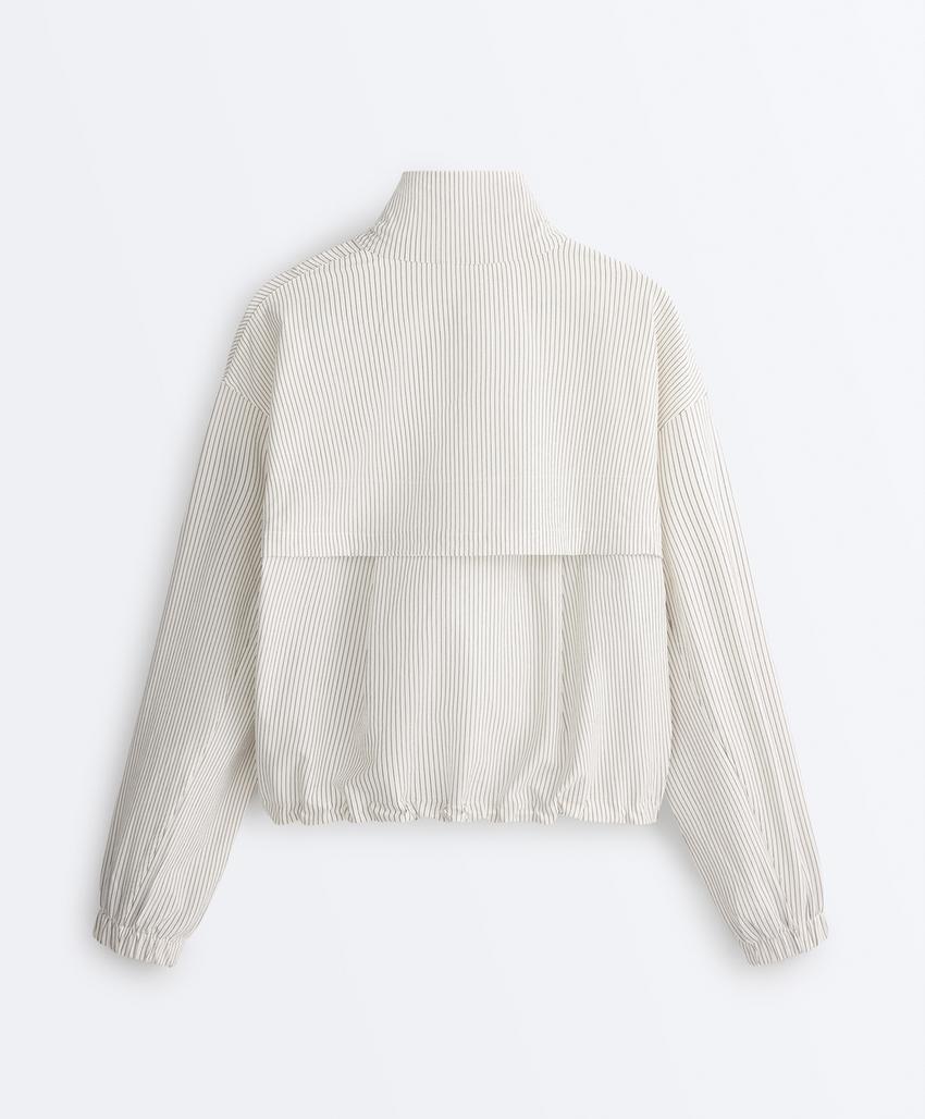 Куртка в полоску из эластичной ткани