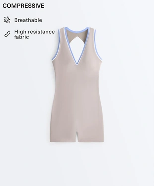 Короткий комбинезон Compressive контрастной расцветки- Заказать в России