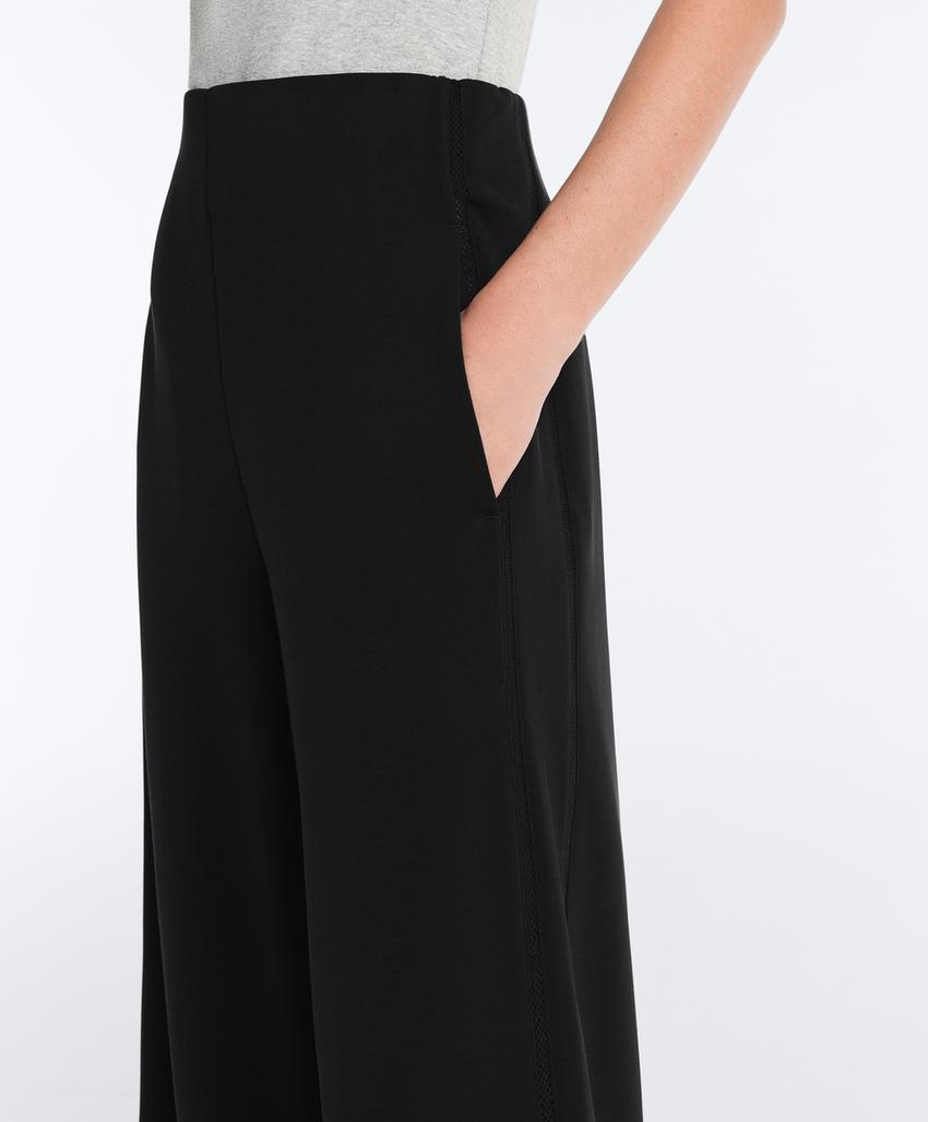 Широкие брюки из модала с ажурным узором