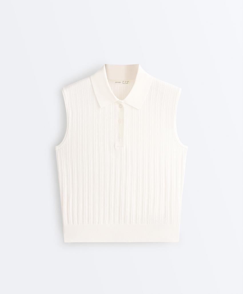 Вязаный жилет ажурной вязки