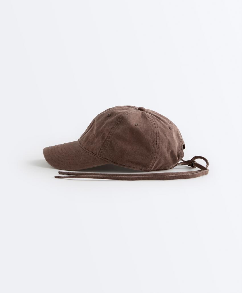 Кепка из 100%-го хлопка с эффектом стирки и шнуровкой