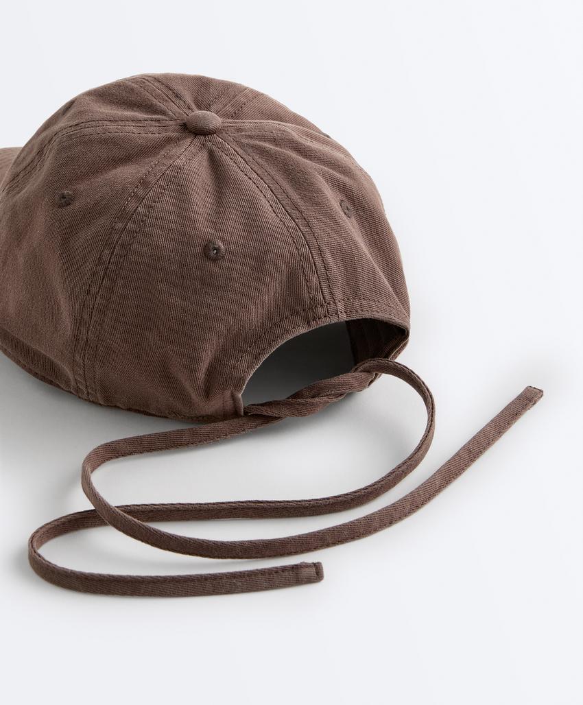 Кепка из 100%-го хлопка с эффектом стирки и шнуровкой