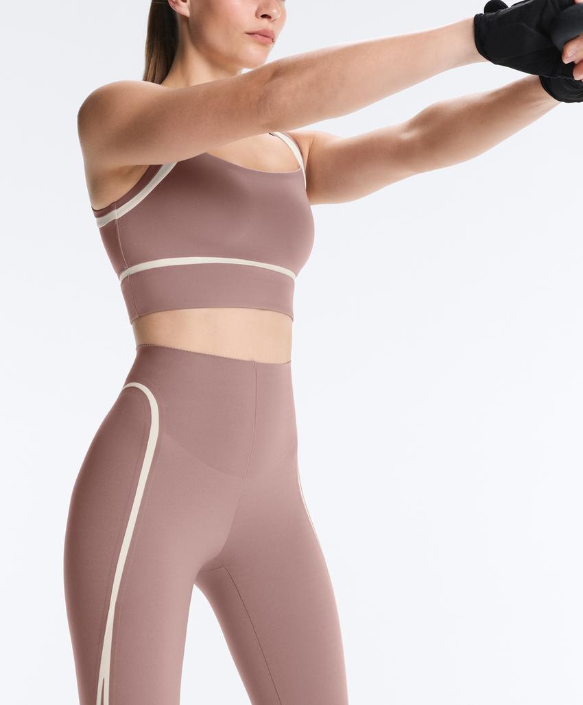 High-rise compressive core-control ankle-length leggings with contrast details