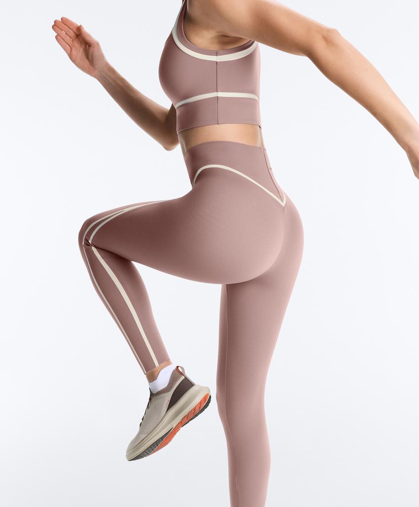 High-rise compressive core-control ankle-length leggings with contrast details