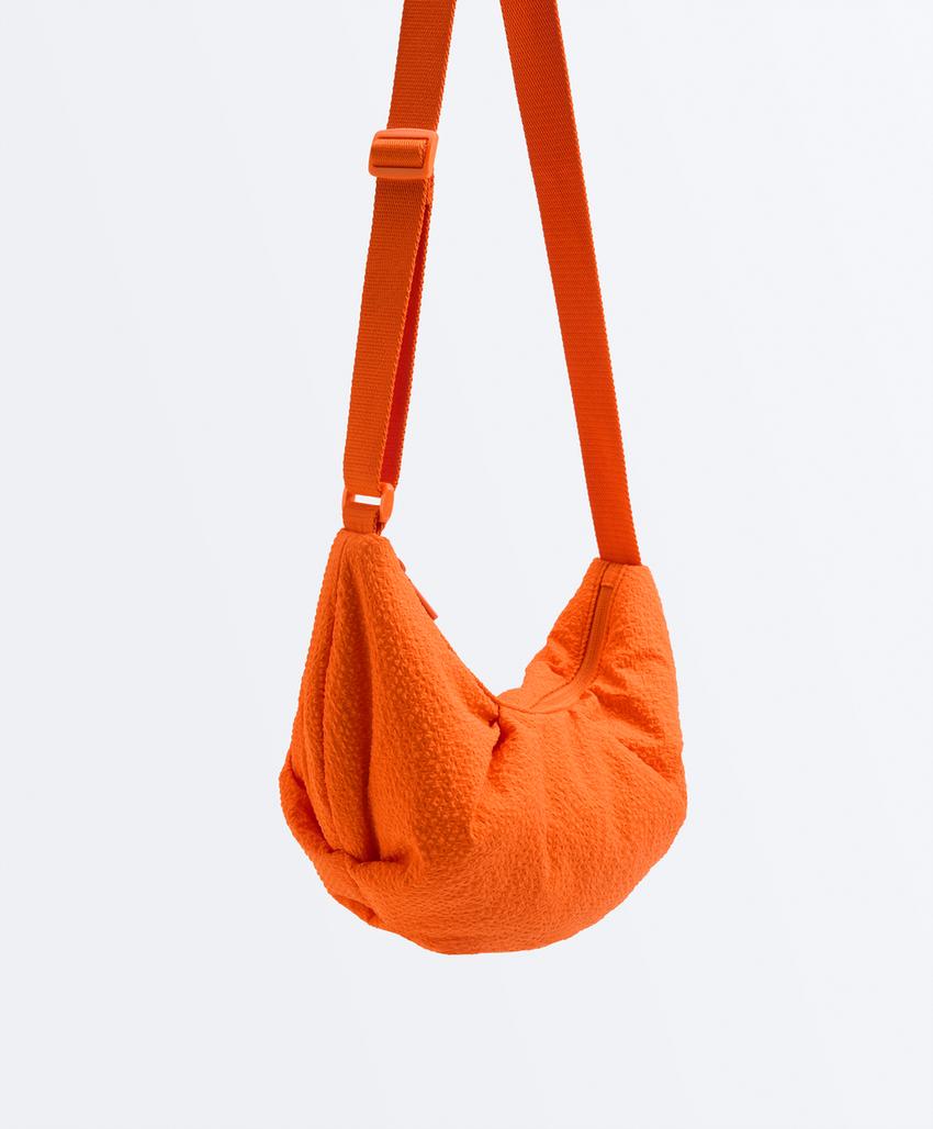 Mala a tiracolo acolchoada aos quadrados