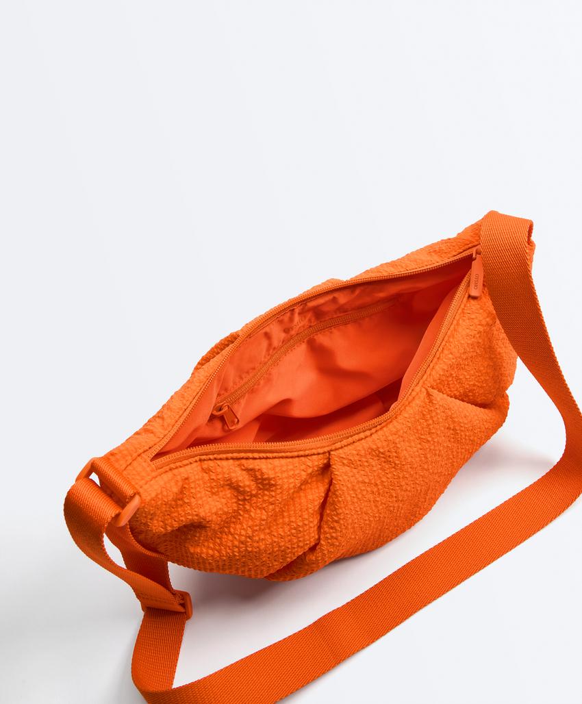 Mala a tiracolo acolchoada aos quadrados