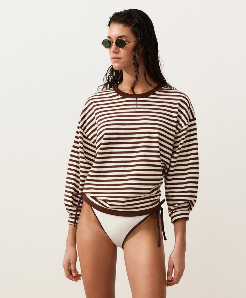 Полуоткрытые плавки бикини с контрастной окантовкой и завязками