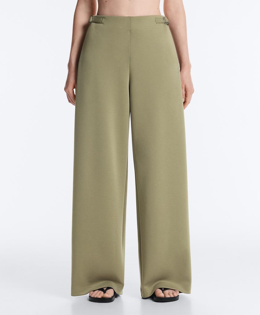 Широкие брюки-пике  с пряжками