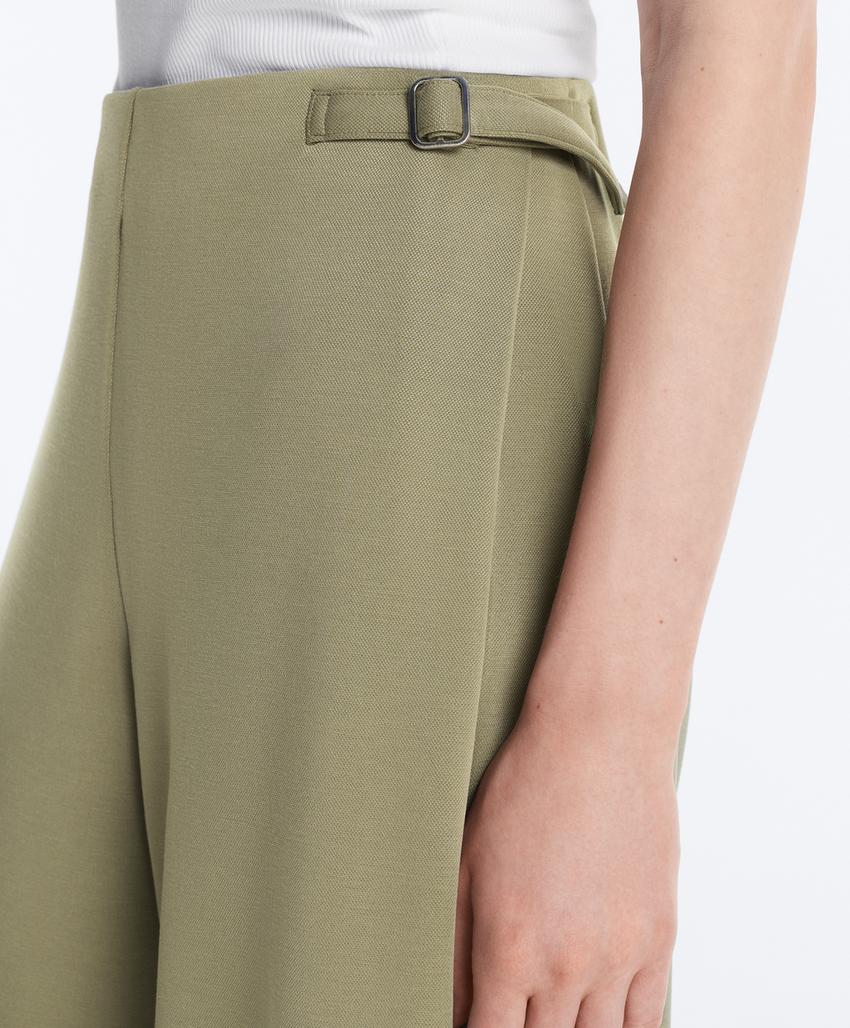 Широкие брюки-пике  с пряжками