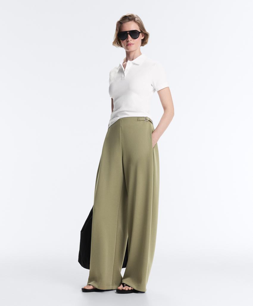 Широкие брюки-пике  с пряжками