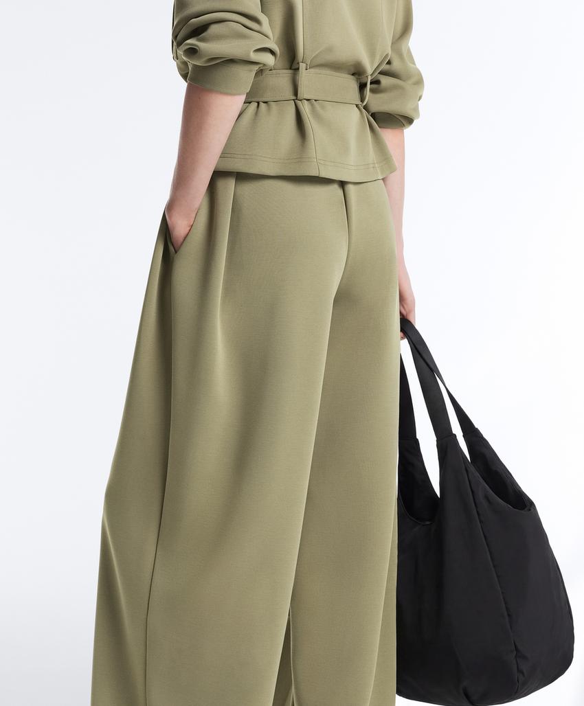 Широкие брюки-пике  с пряжками