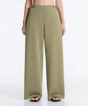 Широкие брюки-пике  с пряжками- Заказать в России