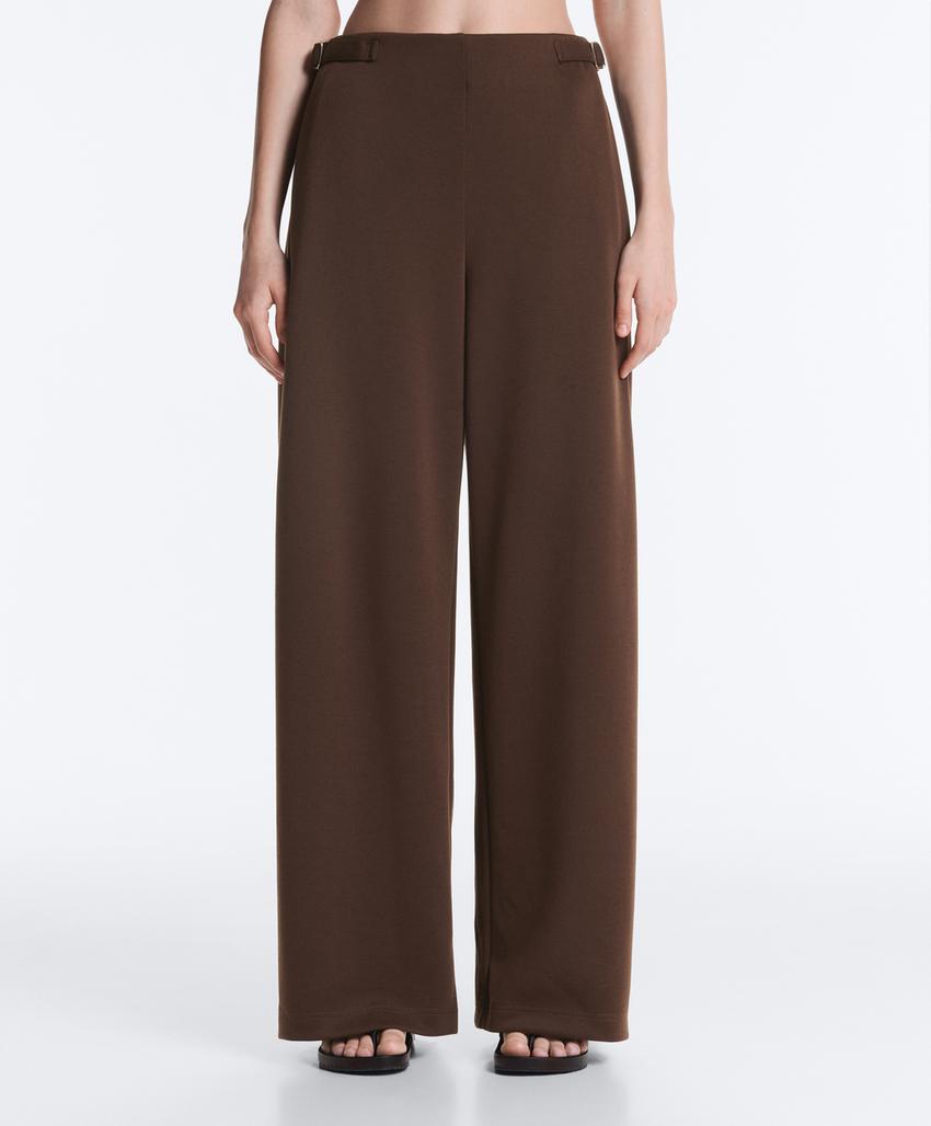 Широкие брюки-пике  с пряжками