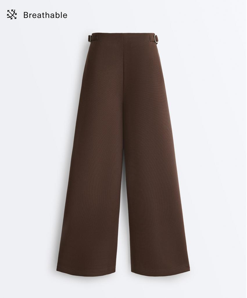 Широкие брюки-пике  с пряжками