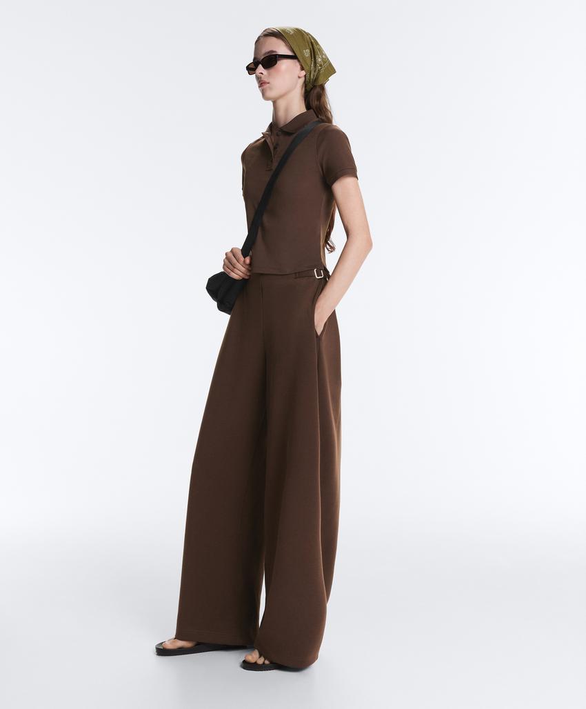 Широкие брюки-пике  с пряжками