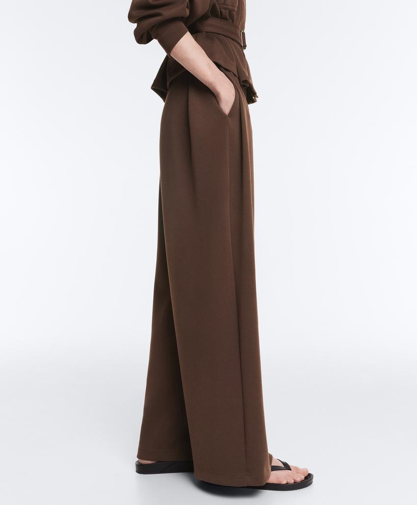 Широкие брюки-пике  с пряжками