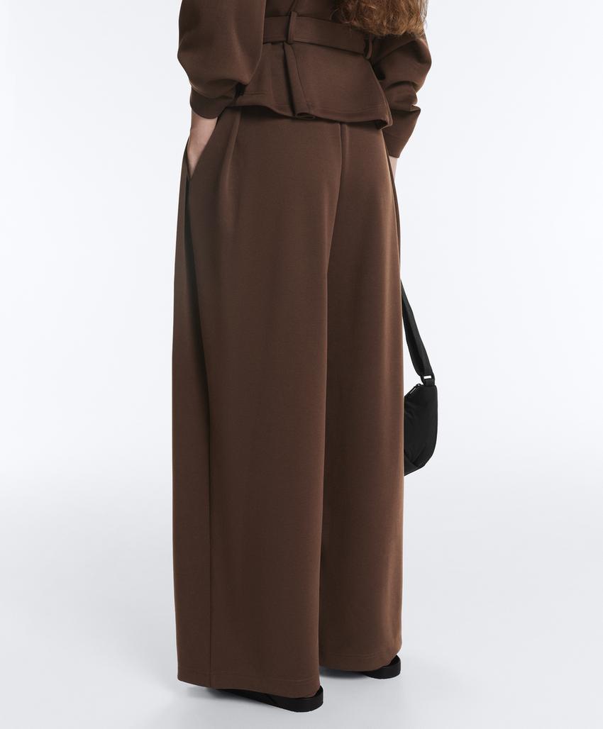 Широкие брюки-пике  с пряжками