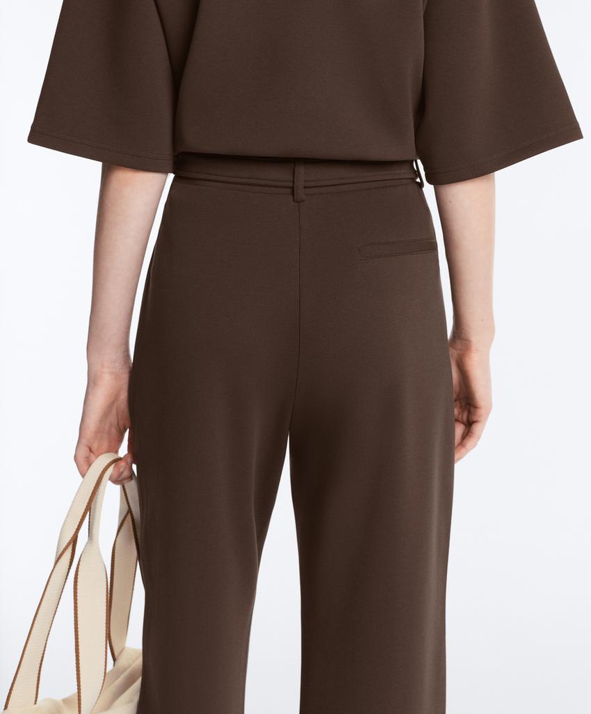 Брюки слим с низкой посадкой из хлопка пике с рельефным швом