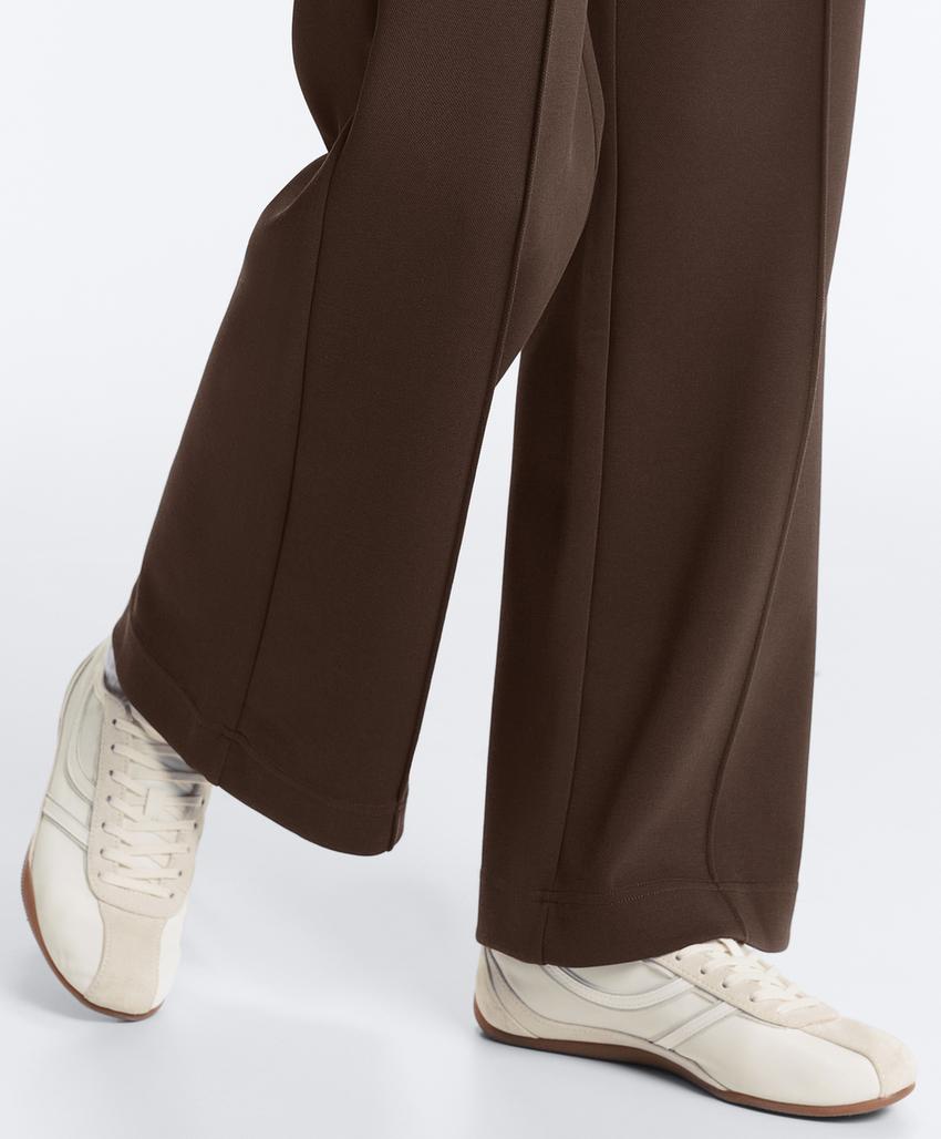 Брюки слим с низкой посадкой из хлопка пике с рельефным швом