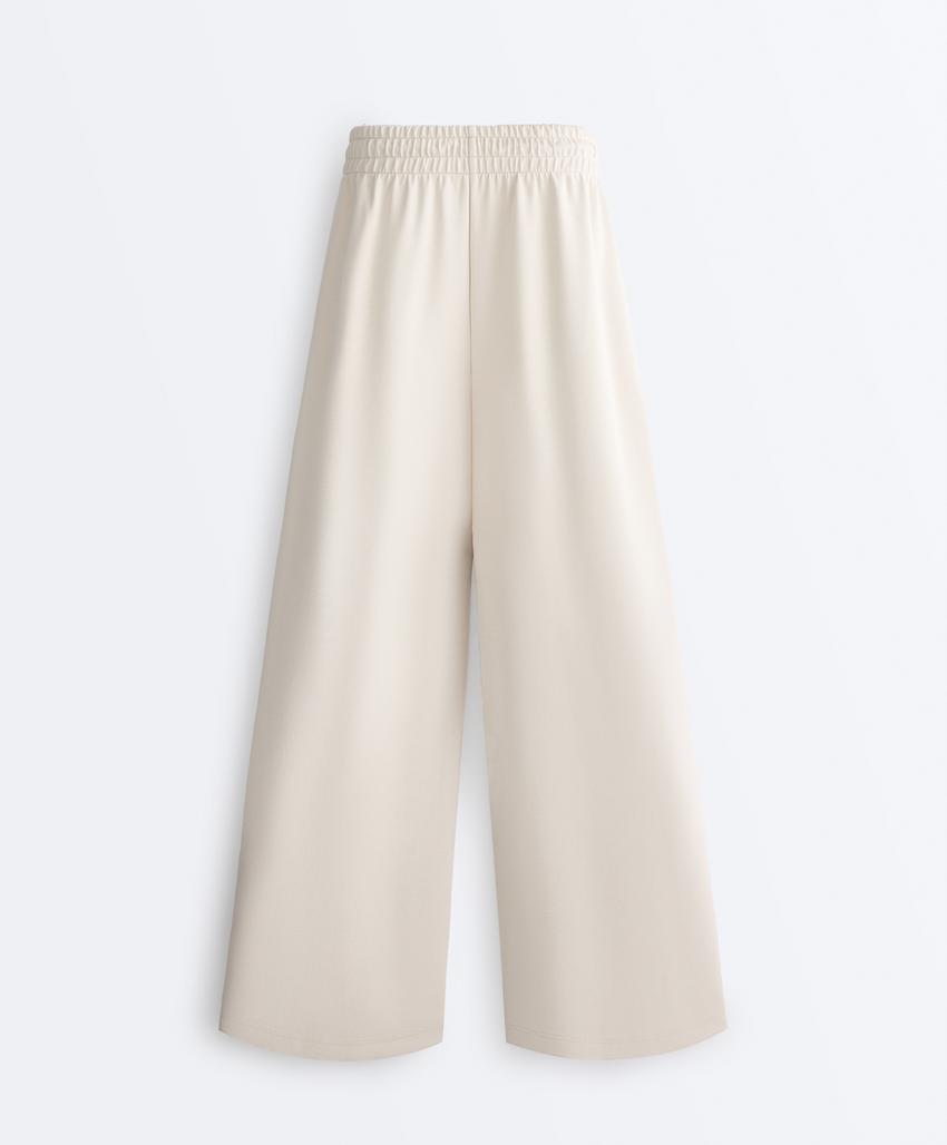 Широкие брюки пике со складками и хлопком