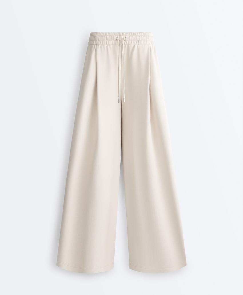 Широкие брюки пике со складками и хлопком