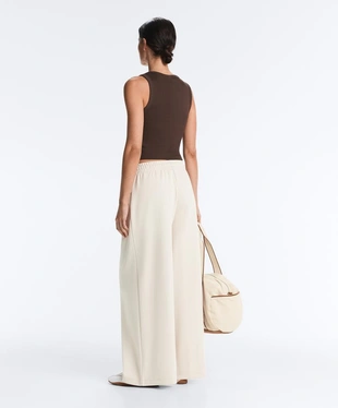 Широкие брюки пике со складками и хлопком- Заказать в России