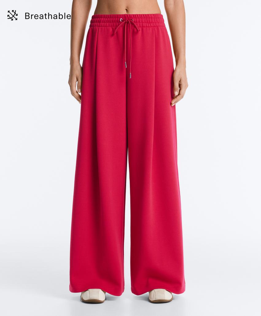 Широкие брюки пике со складками и хлопком