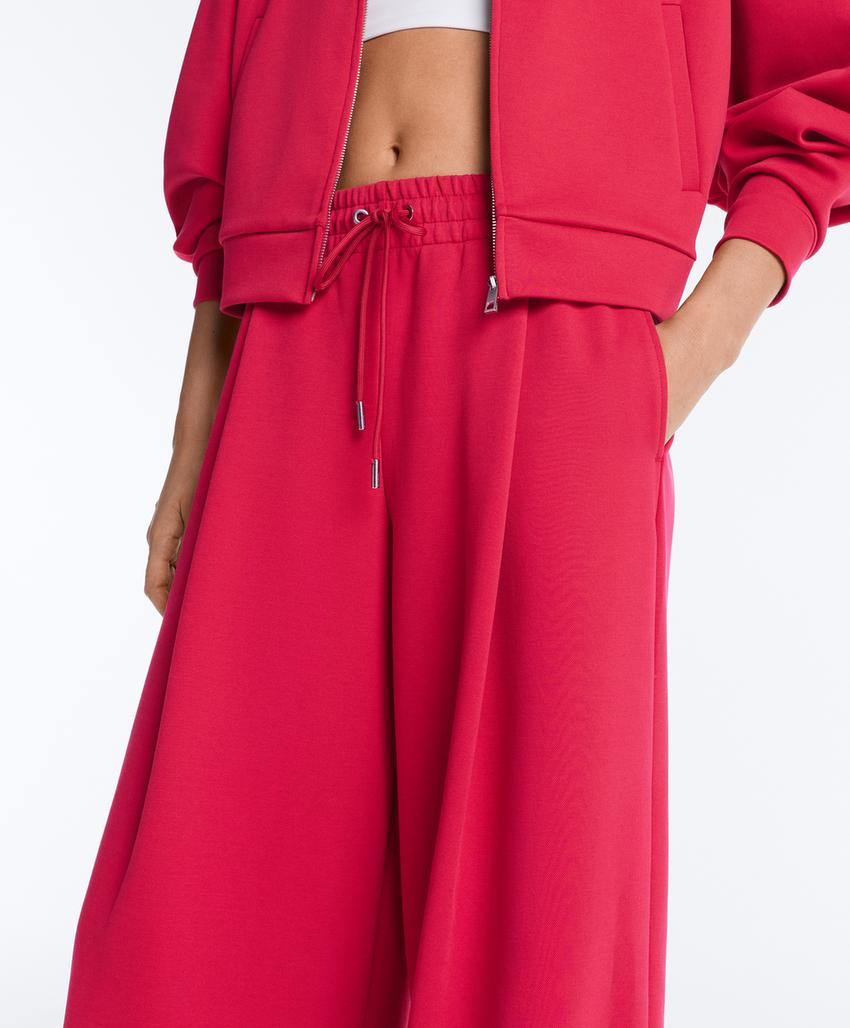 Широкие брюки пике со складками и хлопком