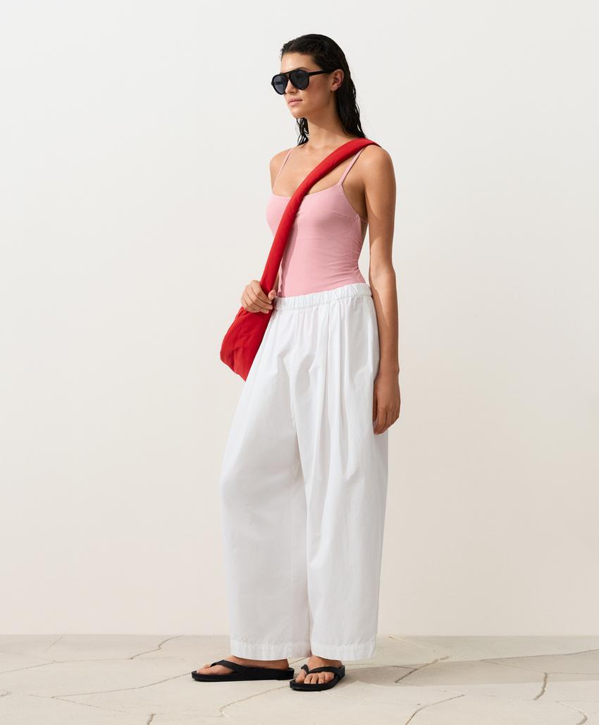 Купальник в полоску с треугольными чашками