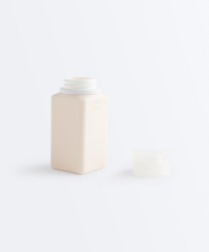 Дорожная косметичка и 4 флакона