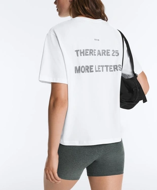 Boxy cotton blend T-shirt with slogan- Заказать в России