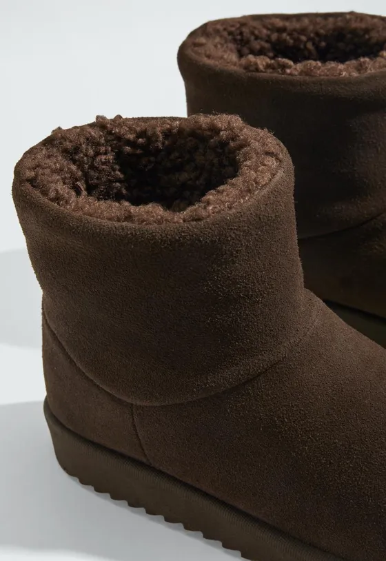 Botins em pele