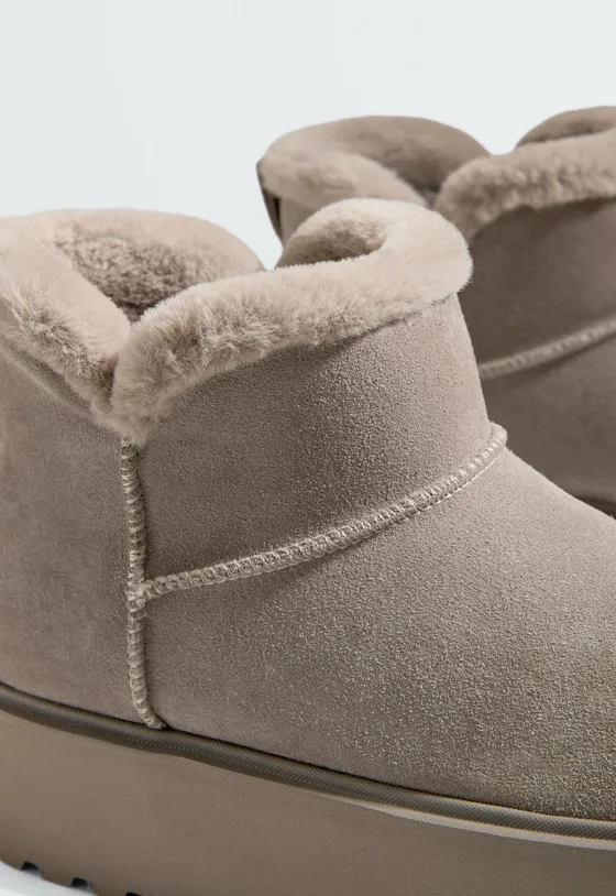 Botins em pele com plataforma