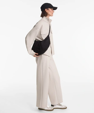 Брюки из ткани с эффектом неопрена, слегка расклешенные внизу- Заказать в России