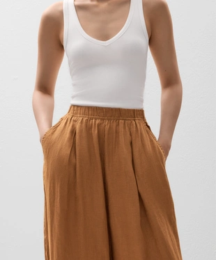 Короткие брюки-бананы из 100%-го льна- Заказать в России