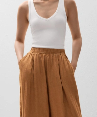 Короткие брюки-бананы из 100%-го льна- Заказать в России