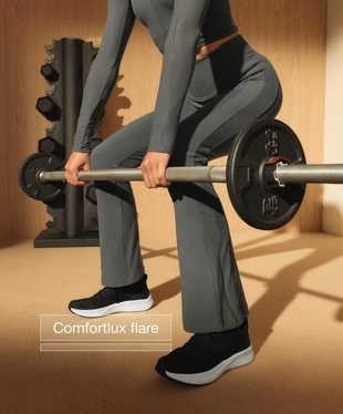 Удобные брюки с высокой посадкой и расклешенными боковыми полосами COMFORTLUX- Заказать в России