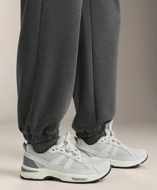 Джоггеры из мягкого модала с меланжем- Заказать в России