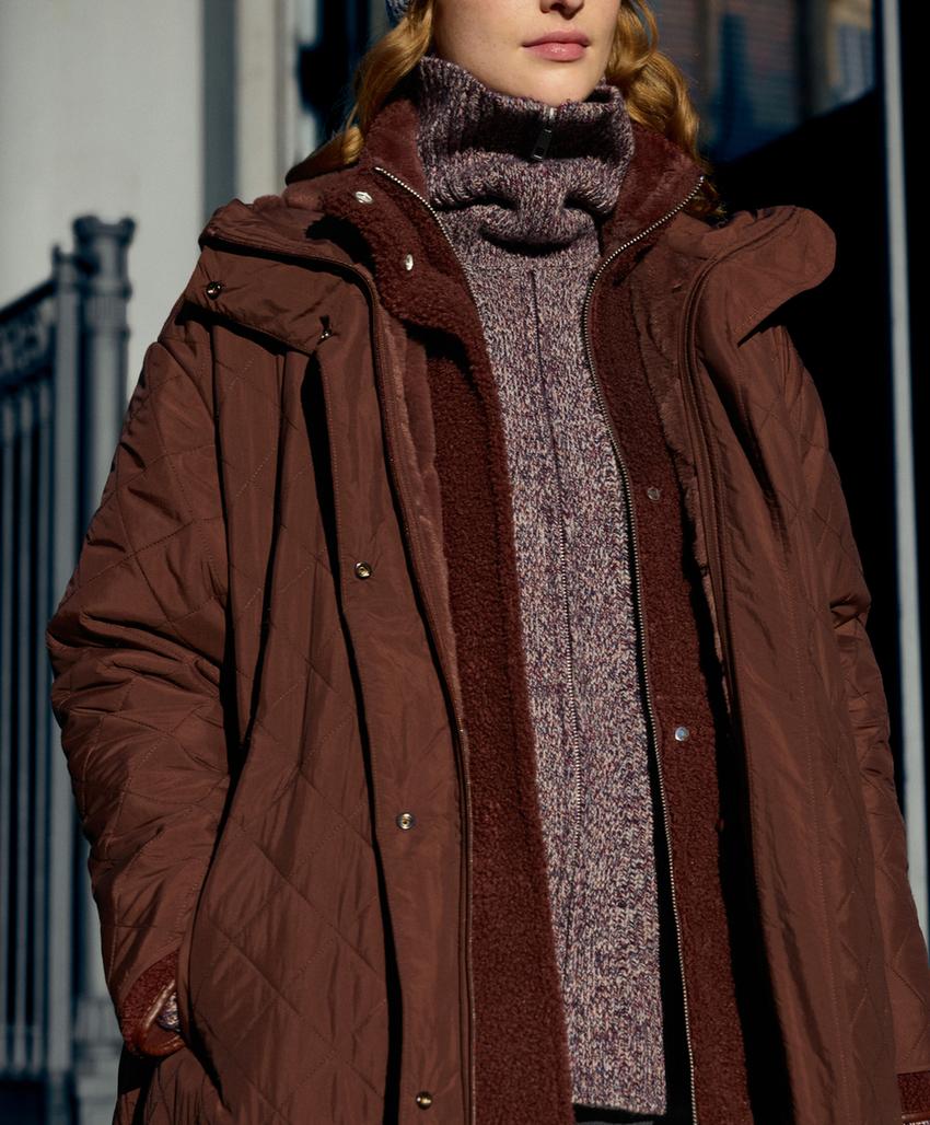 Повёрнутая вязаная куртка с высоким воротником