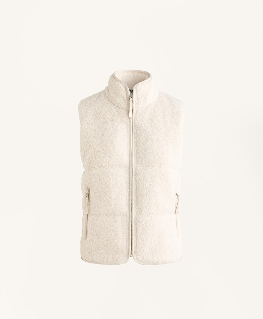 Стежковый жилет из искусственного меха