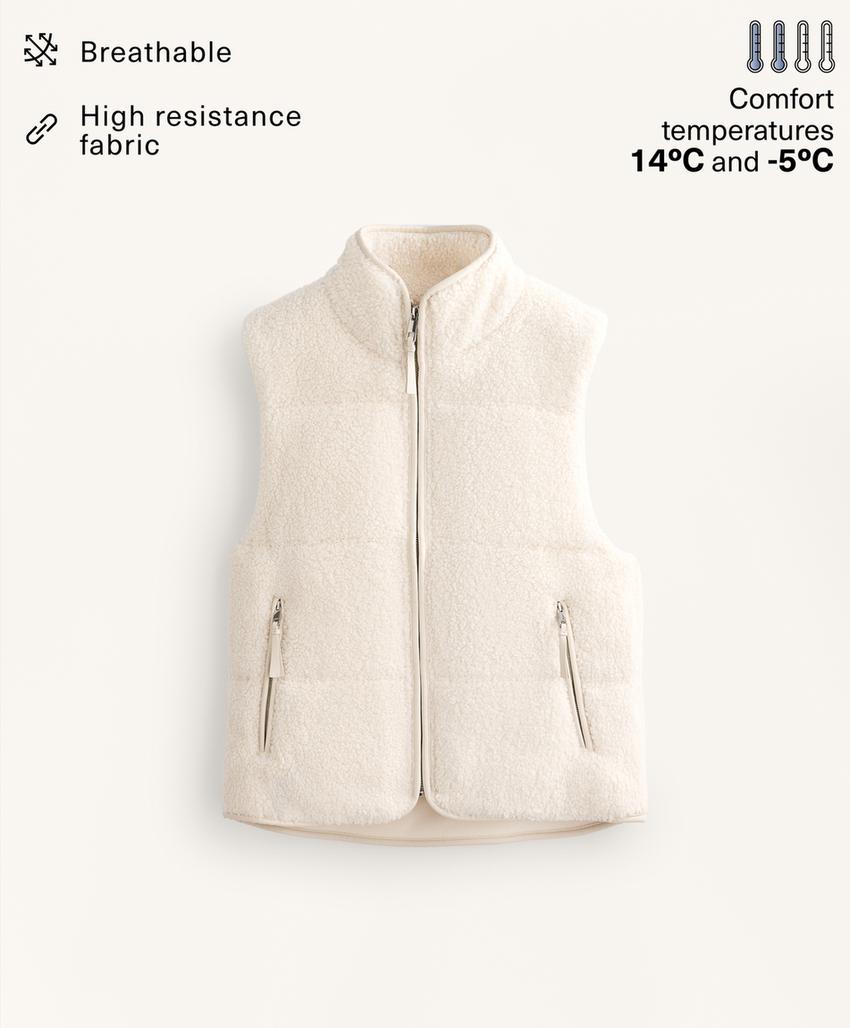 Стежковый жилет из искусственного меха