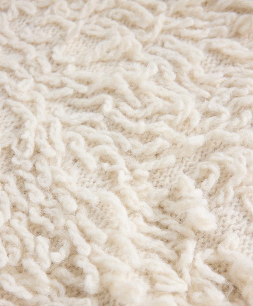 Куртка из вязаного полотна со бахромой