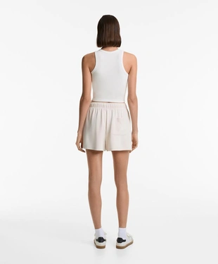 Удлиненный топ-майка в рубчик из смесового модала- Заказать в России