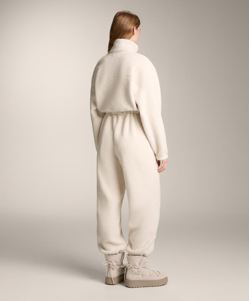 Легкий комбинезон из искусственной овчины с регулируемой талией